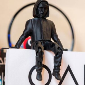 Seated Black Mask Figure (Front Man) from the "Squid Game" Series